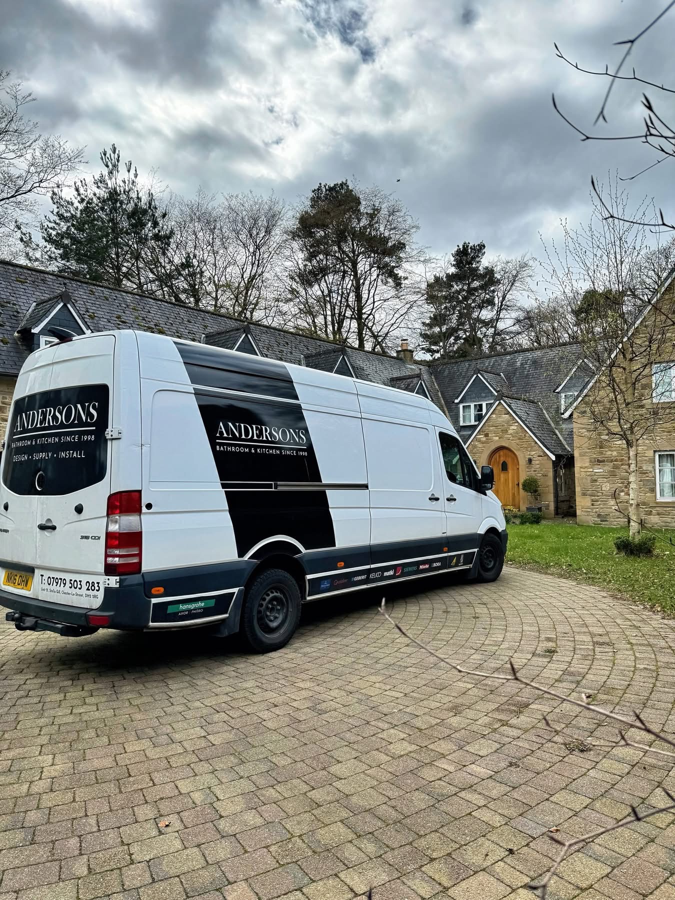 Andersons Homes van outside a recent project